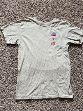 Lost Beige Graphic Tee with Red Cherry Detail